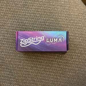 ZipString LUMA Glow-In-The-Dark String Launcher Toy